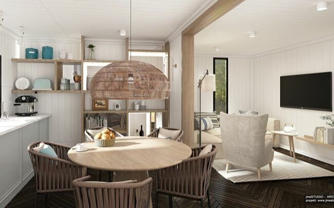 Projekt jasnych eleganckich wnętrz w stylu Hampton to aranżacja wnętrz domu wakacyjnego nad jeziorem z białym drewnem na ścianach