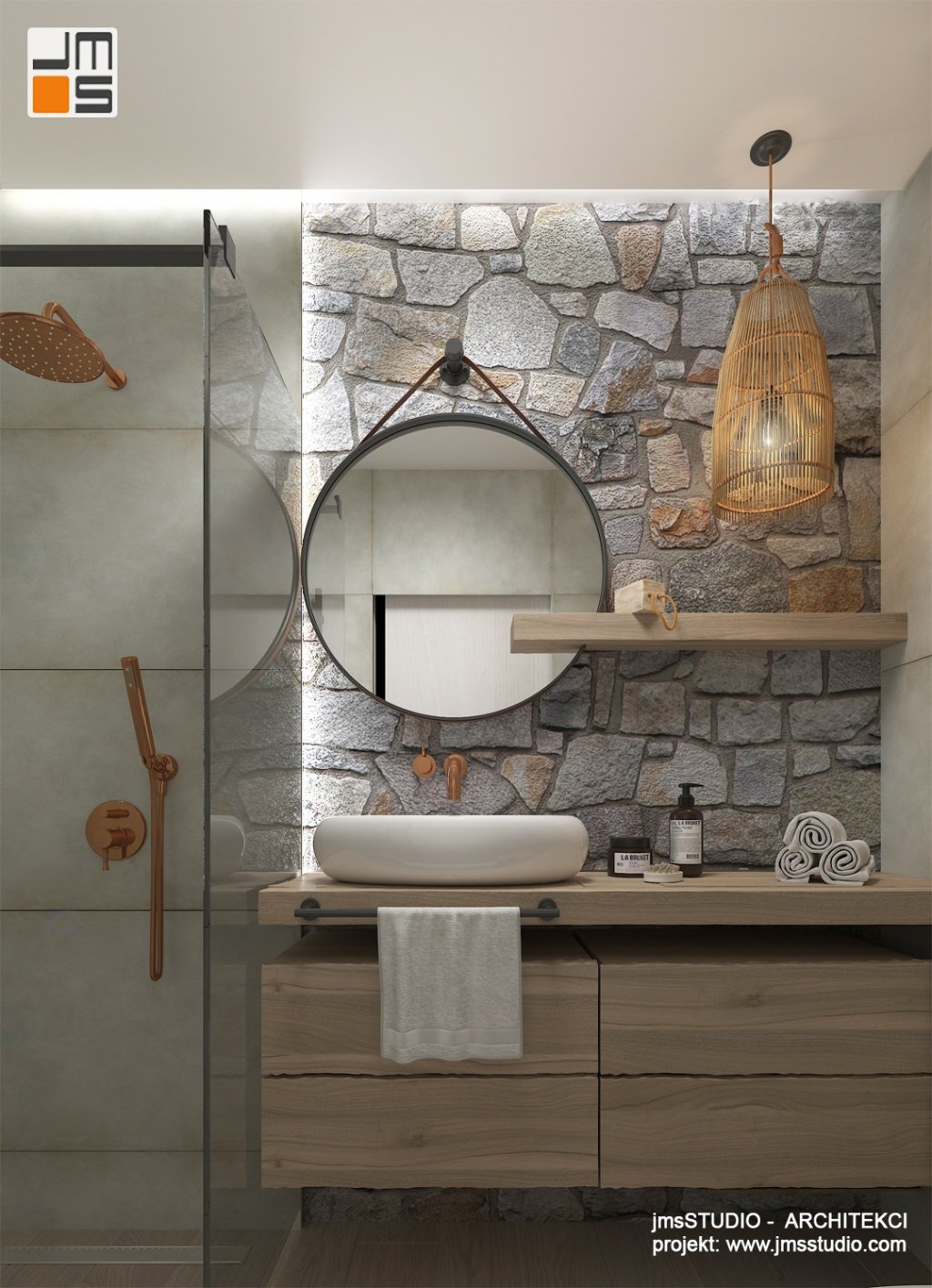 Architekt wnętrz zastosował w  małej łazience naturalny kamień , jasne drewno i ładne okrągłe lustro