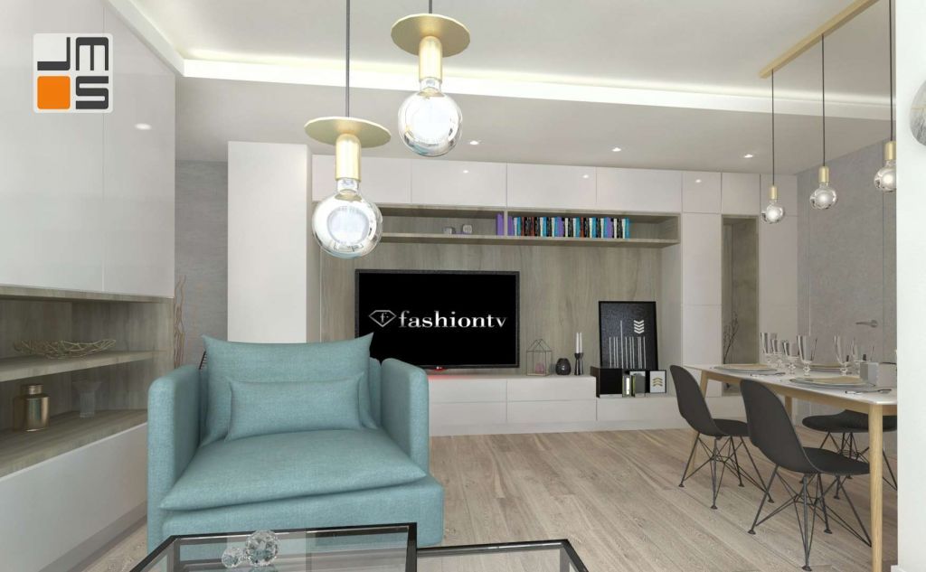 Zabudowa pod telewizor w salonie jest neutralnym tłem dla designerskich lamp z mosiądzu.