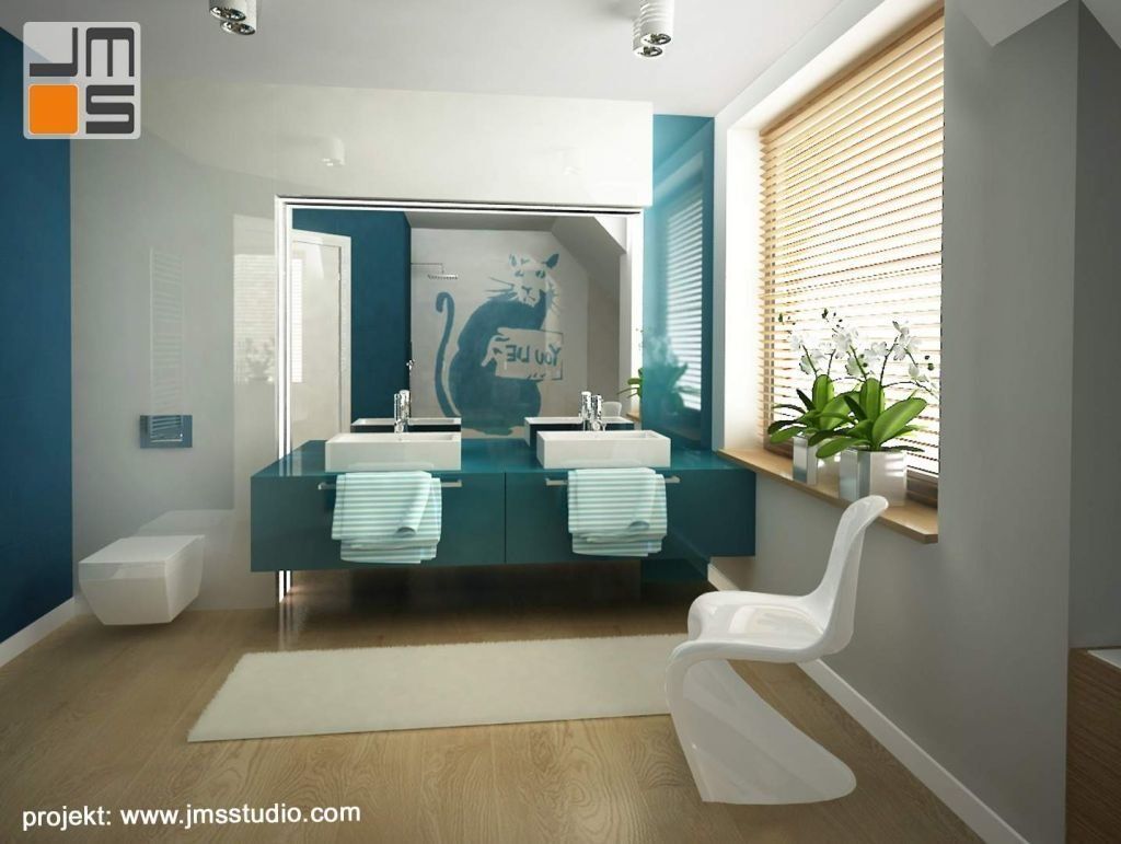 Grafika Banksy jest głównym elementem dekoracyjnym w projekcie nowoczesnej łazienki młodzieżowej w kolorach odcieni niebieskiego