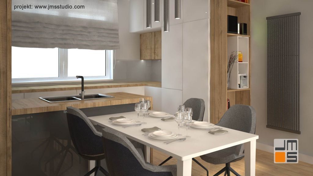 Projekt nowoczesnej kuchni bez uchytów w stylu skandynawskim z designerskim grzejnikiem na ścianie.